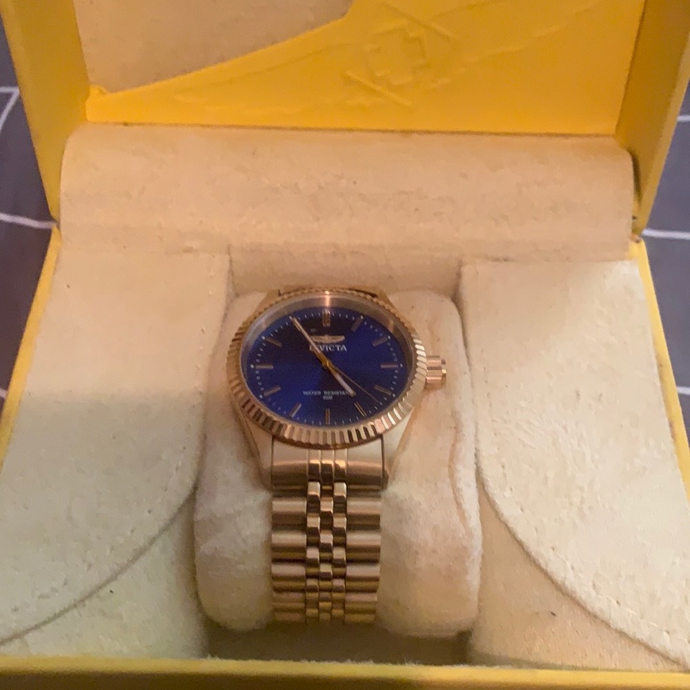 Invicta watch gold with blue dial